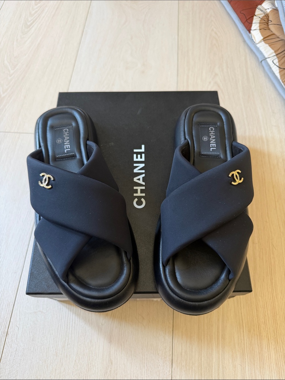 CHANEL Black Crisscross Slide Mules with Gold CC Accent